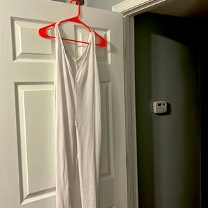 Sleeveless white top split down the middle